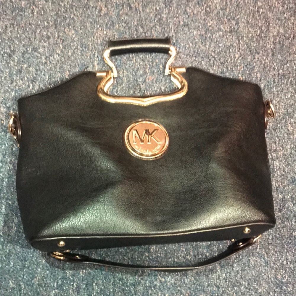 Black and gold Michael Kors bag